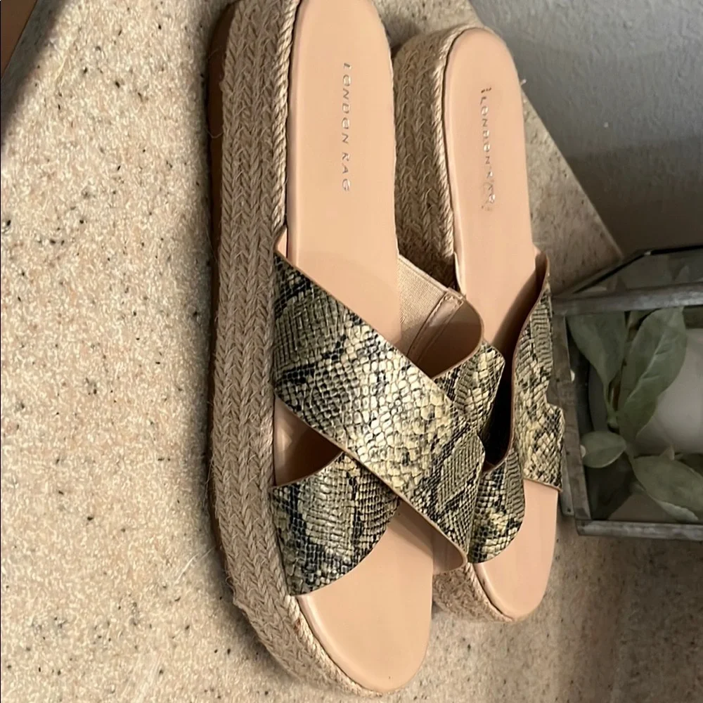 Cream and Black Sandals with Cross-Strap Design